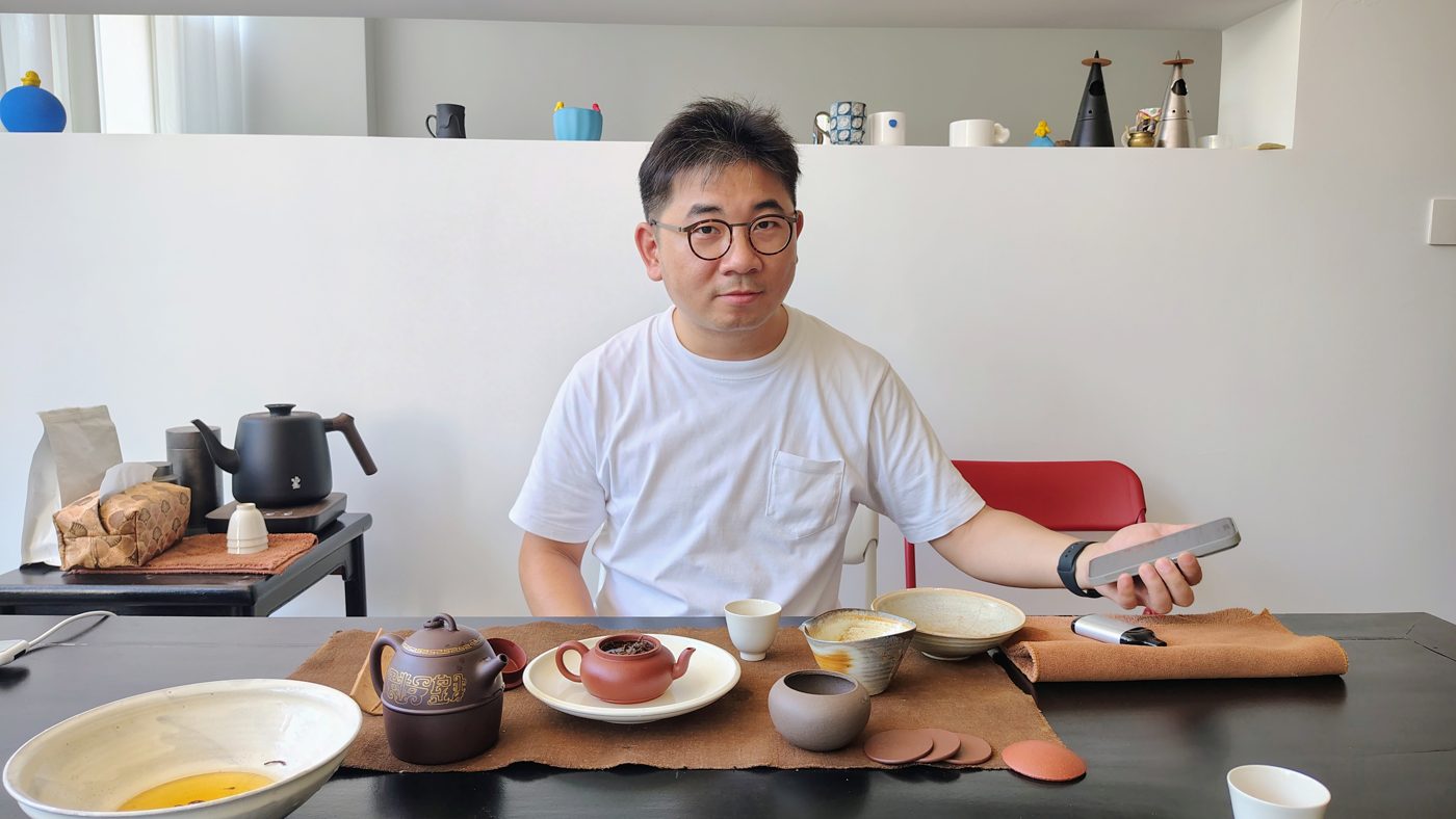 Preparing tea at a table in Yixing, 17 August